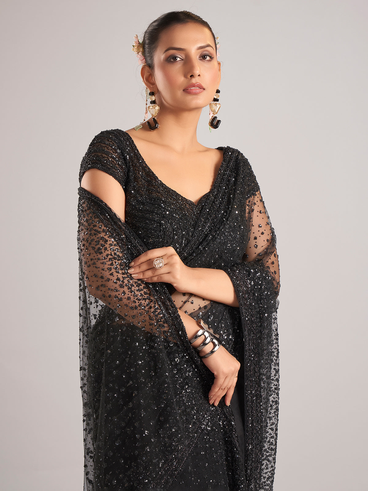 Black net saree with cutdana embellishments for women