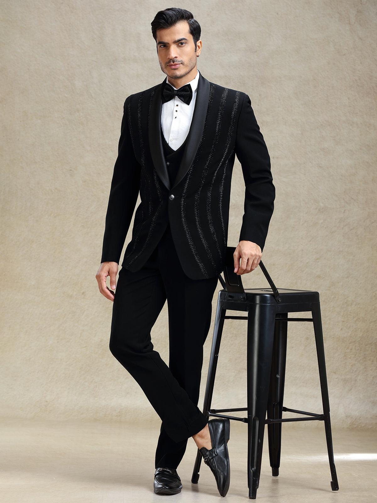 Black terry rayon tuxedo suit in crystal work