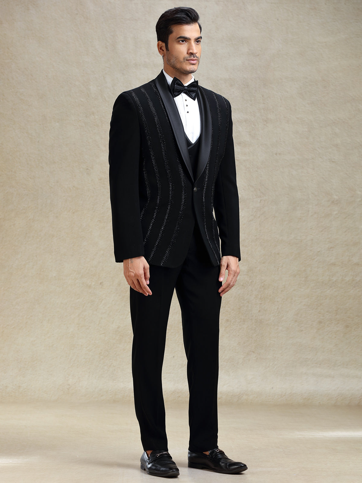 Black terry rayon tuxedo suit in crystal work