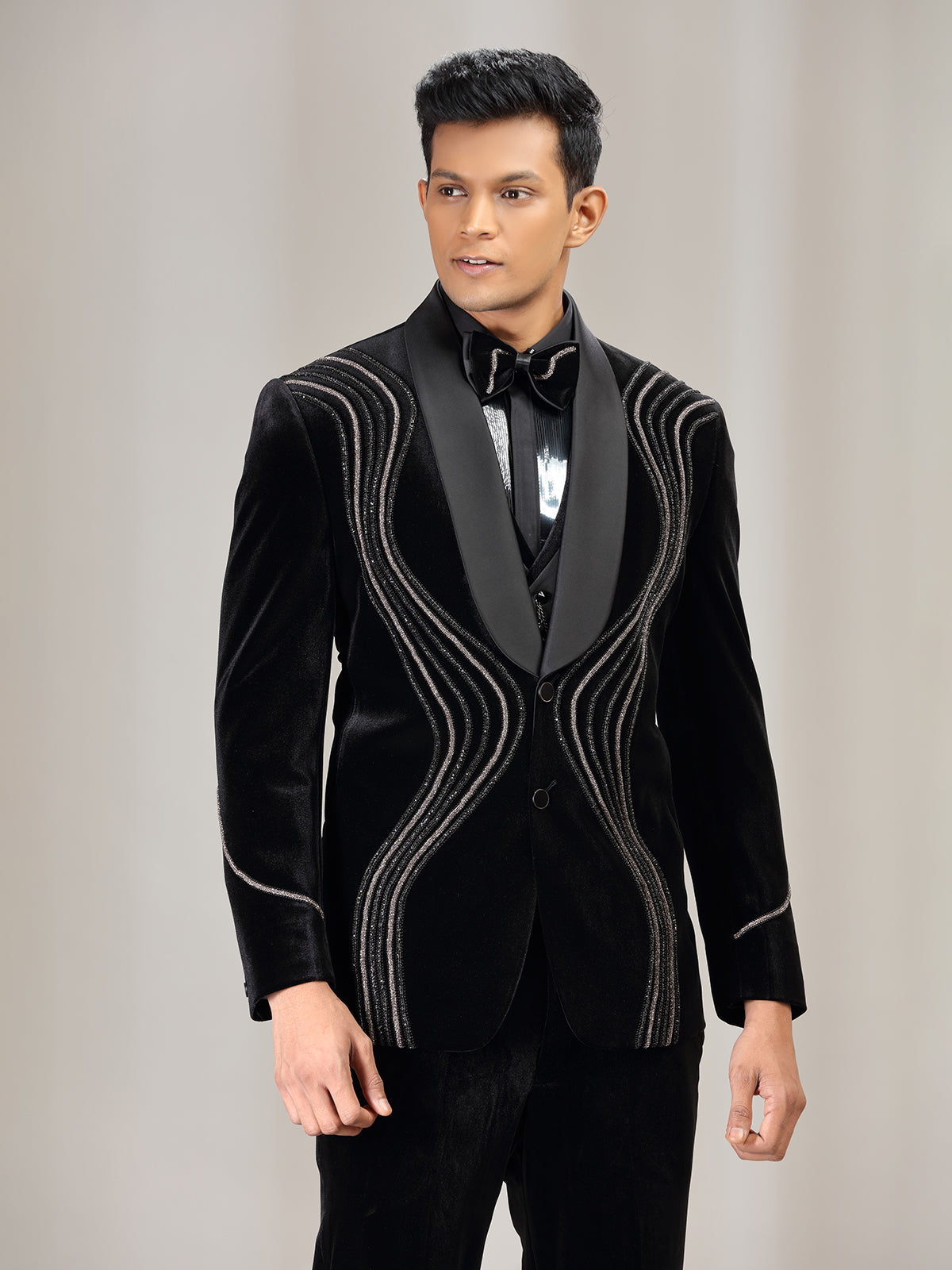 Black velvet coat suit with bead and diamond embellishment