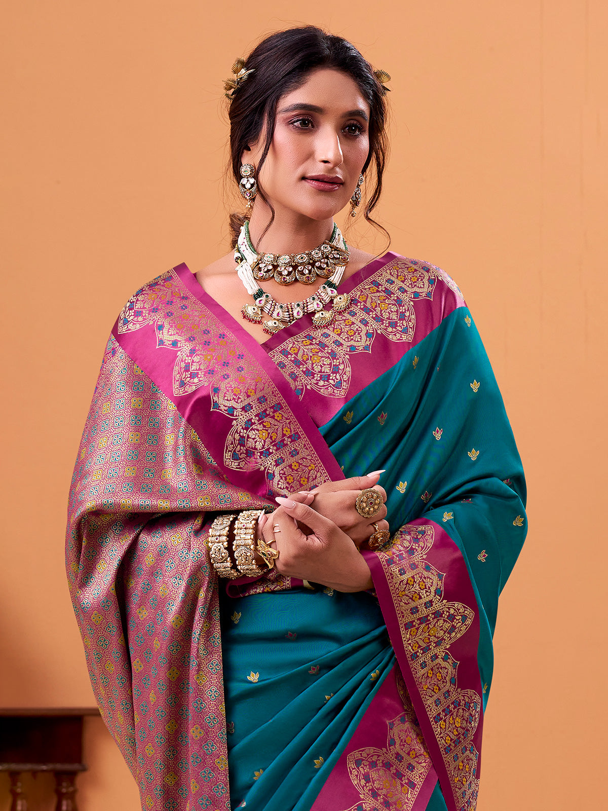 Blue satin silk saree with zari motifs
