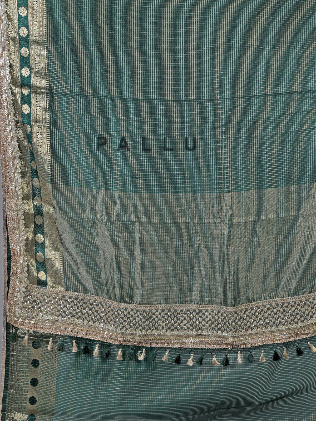 Bottle green dola silk saree with zari weaving