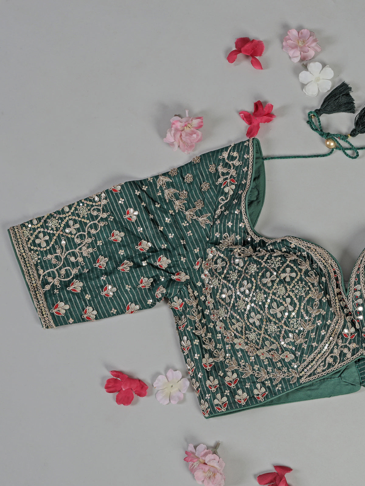 Bottle green dola silk saree with zari weaving