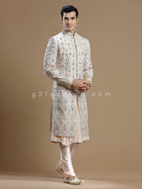 Cream and peach raw silk groom wear sherwani