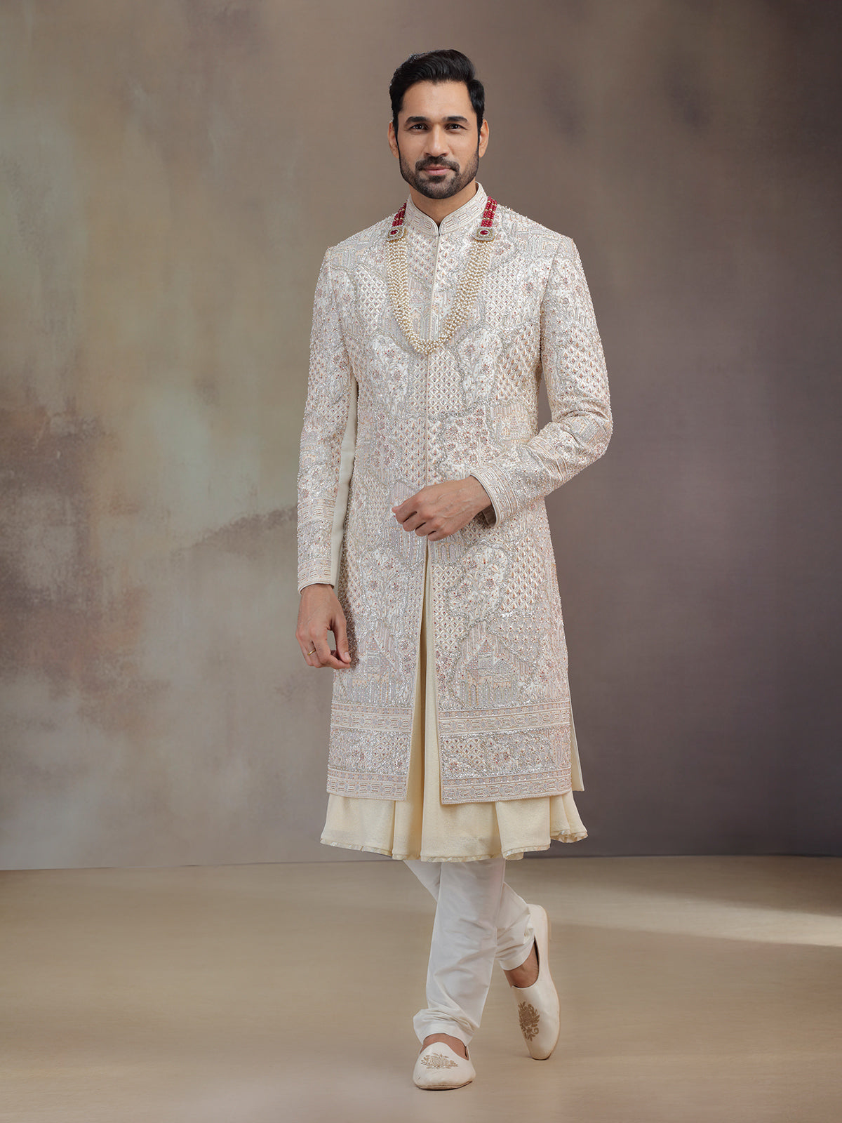 Cream peshwai silk sherwani for groom