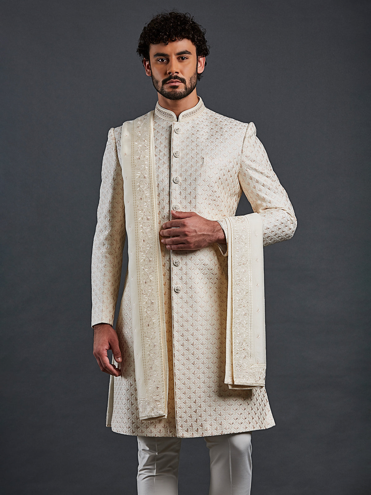 Cream raw silk groom style sherwani
