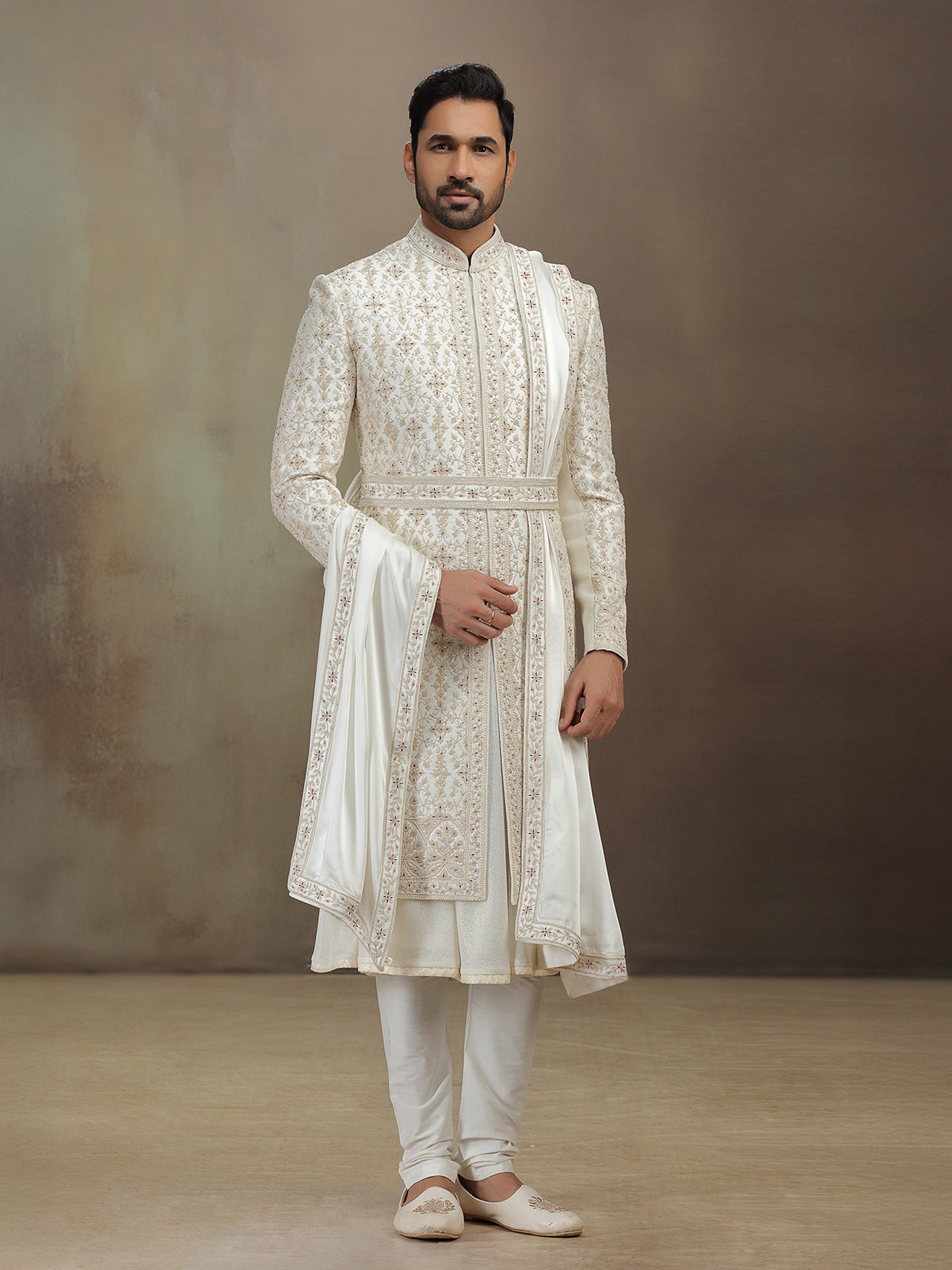 Cream silk peshwai groom sherwani with dupatta