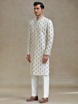 Cream  silk wedding style long jacket sherwani set