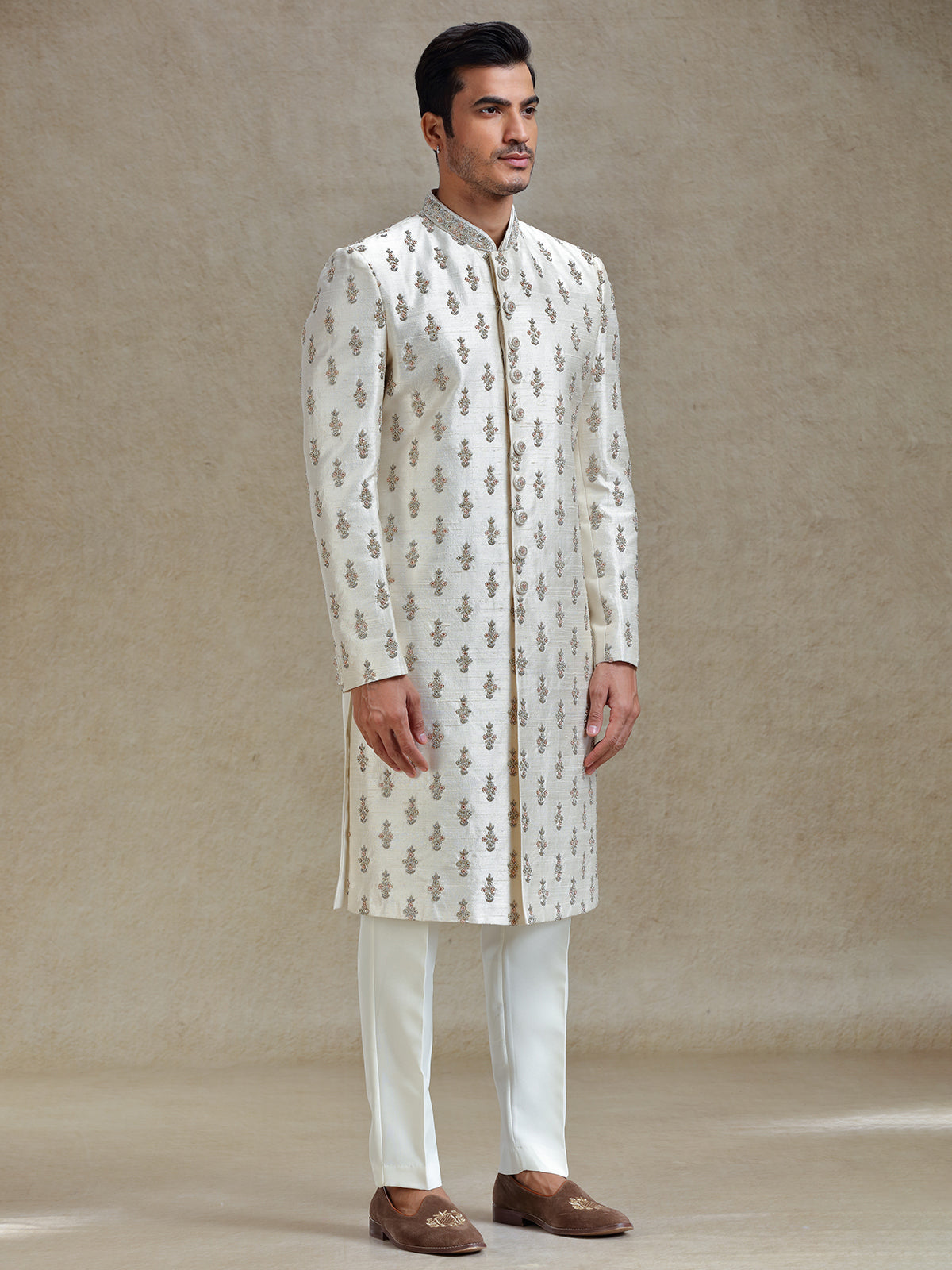 Cream  silk wedding style long jacket sherwani set