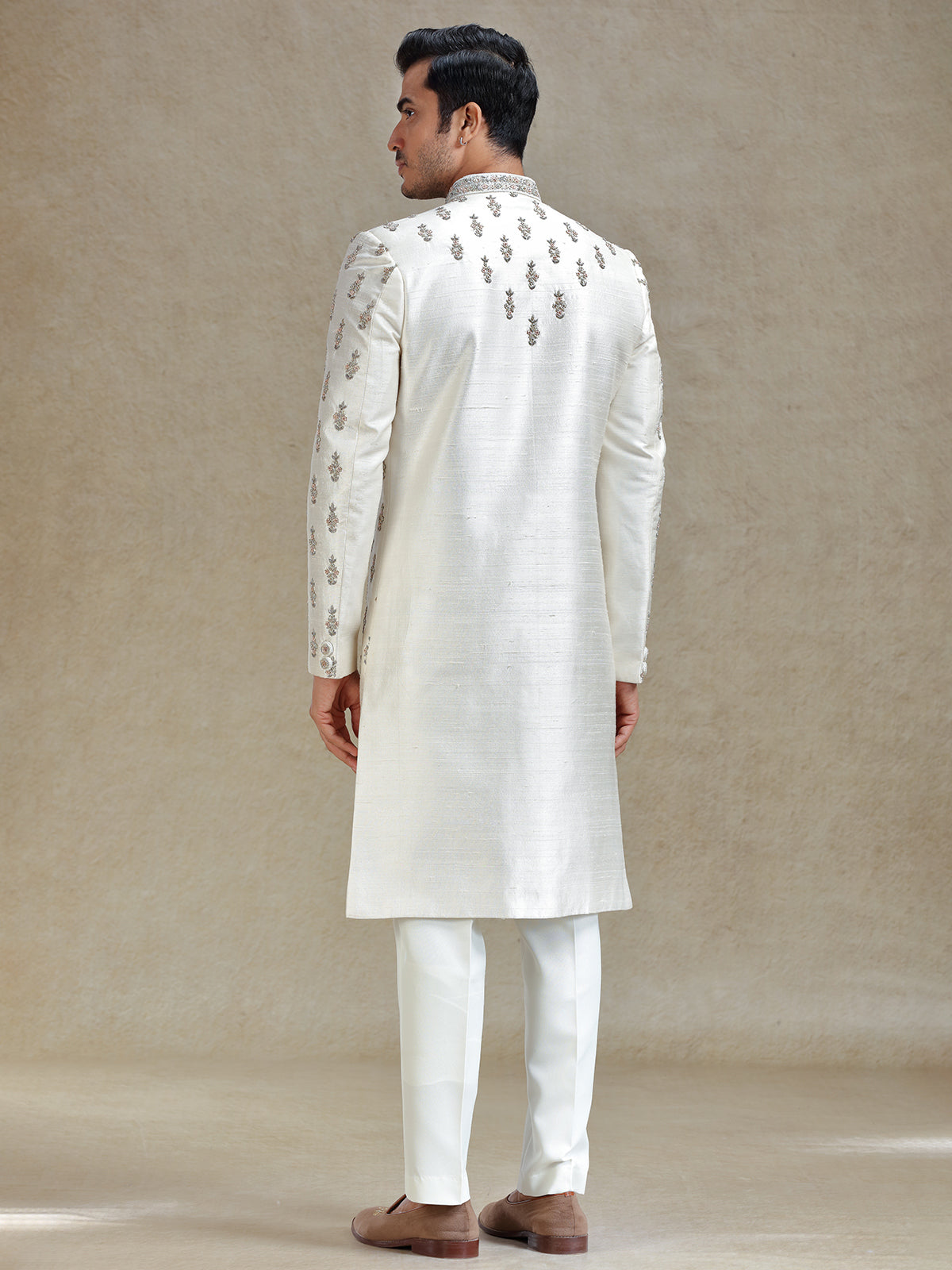 Cream  silk wedding style long jacket sherwani set