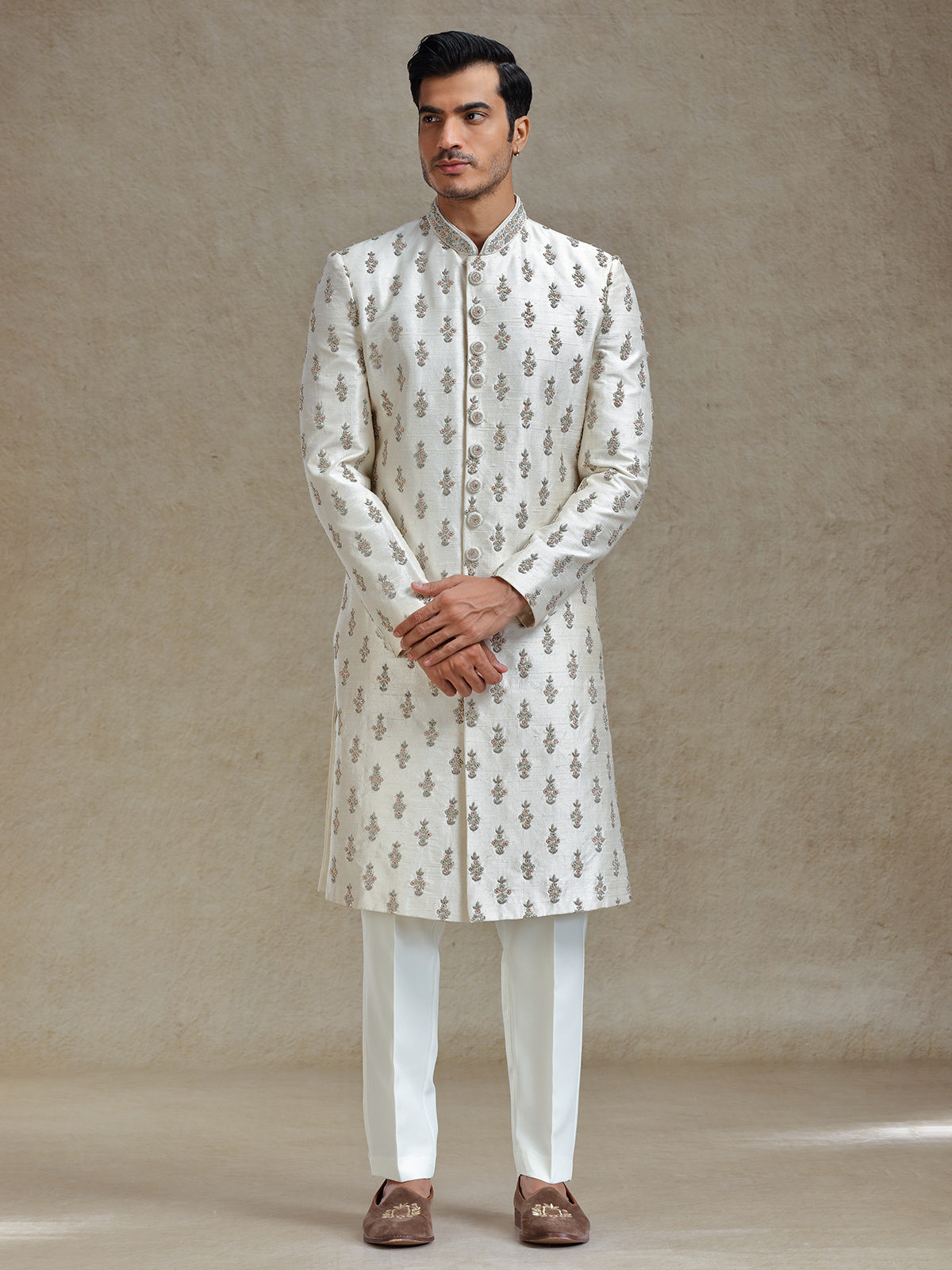Cream  silk wedding style long jacket sherwani set