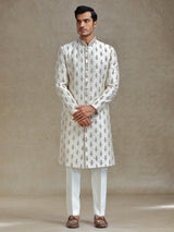 Cream  silk wedding style long jacket sherwani set