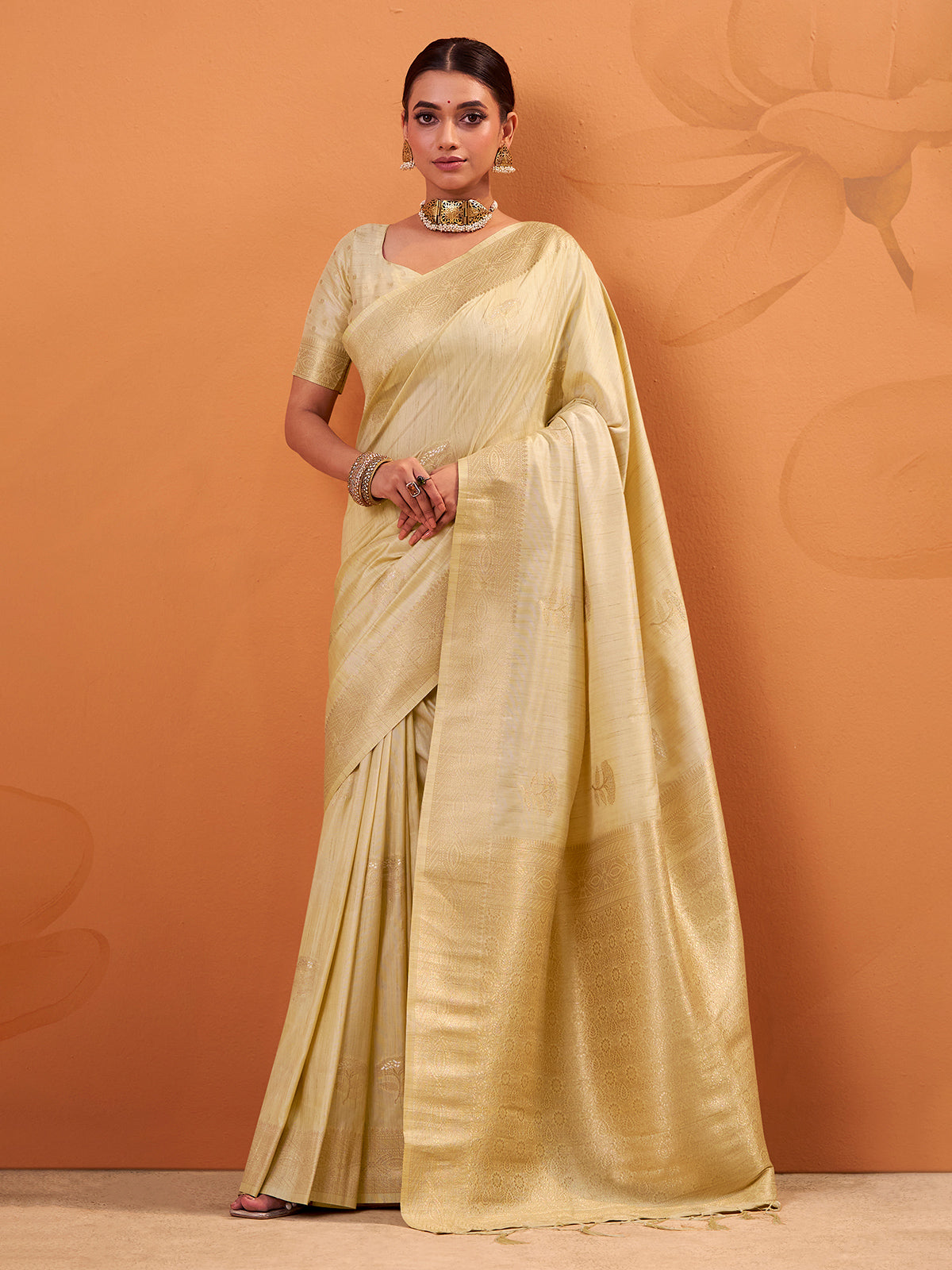 Cream tusser silk saree with elegant zari weaving