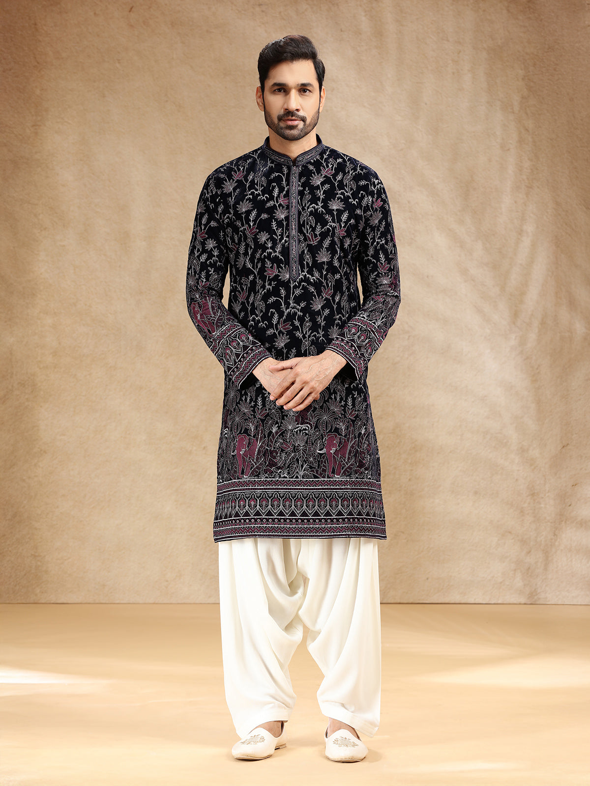 Dark blue velvet kurta pajama with shimmering resham work
