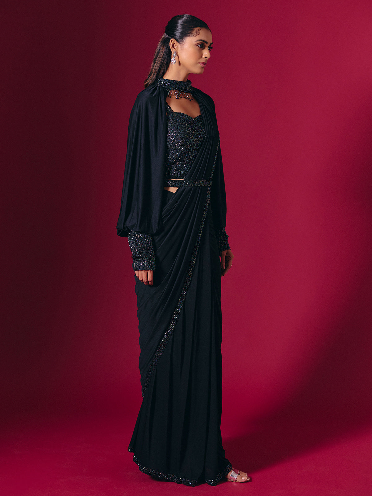 Elegant black lycra saree with cutdana pearl work