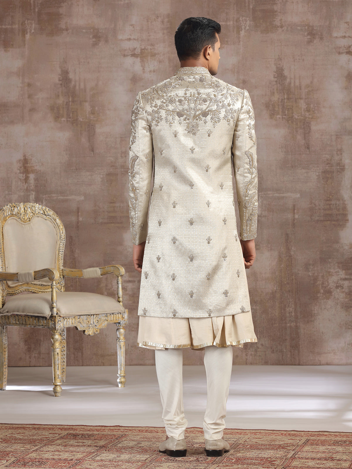 Gold silk peshwai sherwani with diamond embellishments
