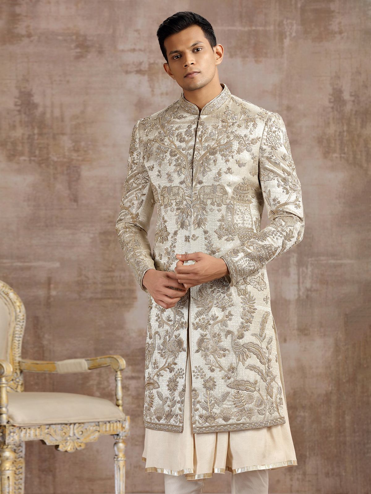 Gold silk peshwai sherwani with diamond embellishments