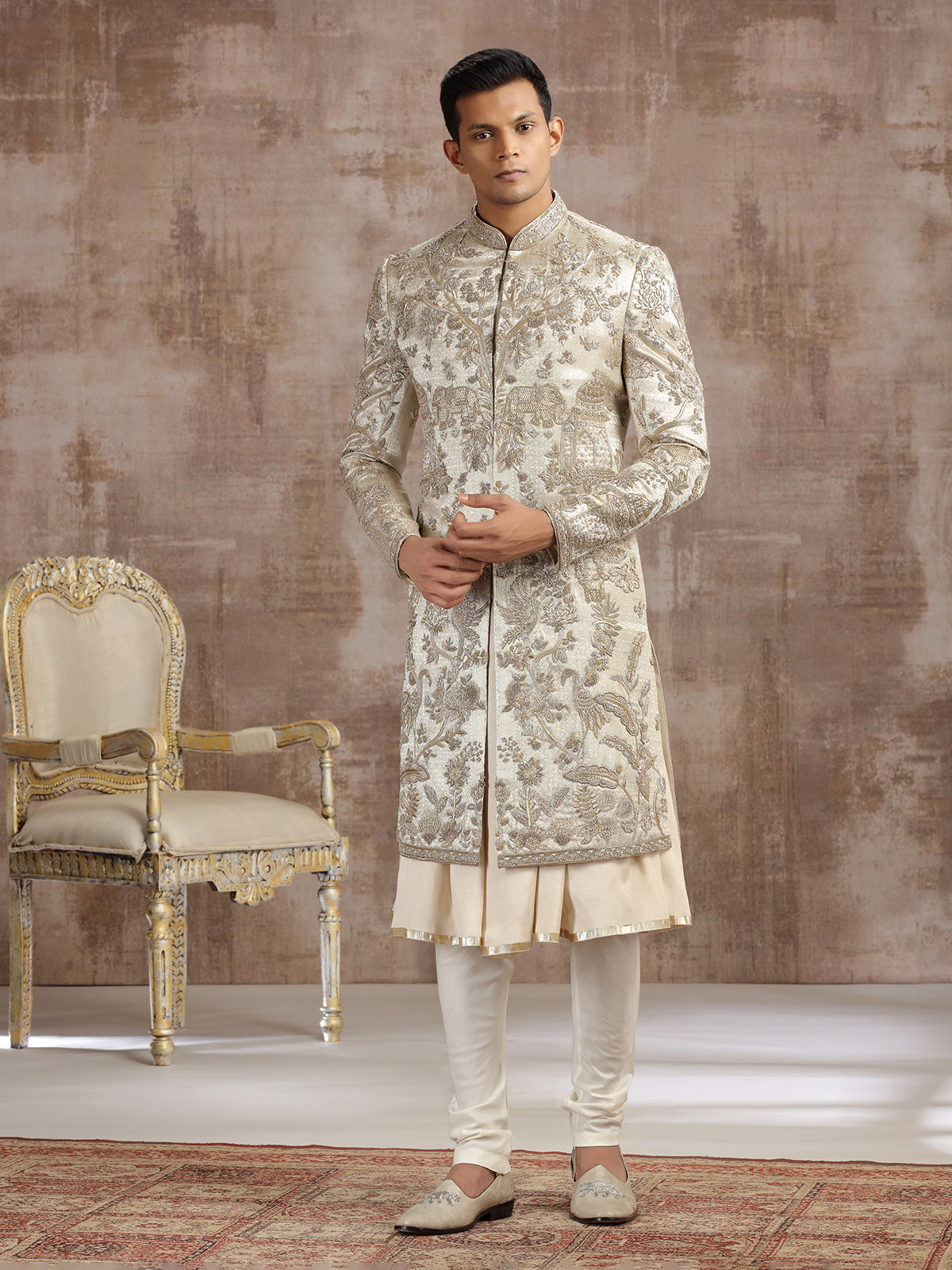 Gold silk peshwai sherwani with diamond embellishments
