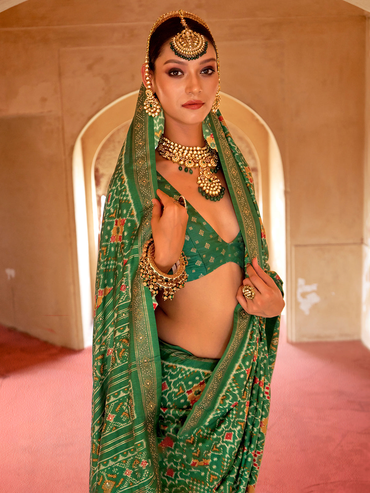 Green festive wear patola silk saree