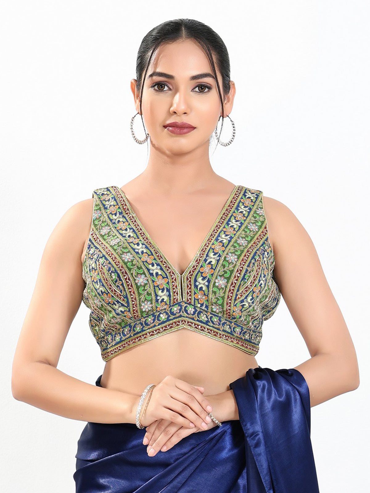 Green georgette thread and sequins V neck sleeveless blouse