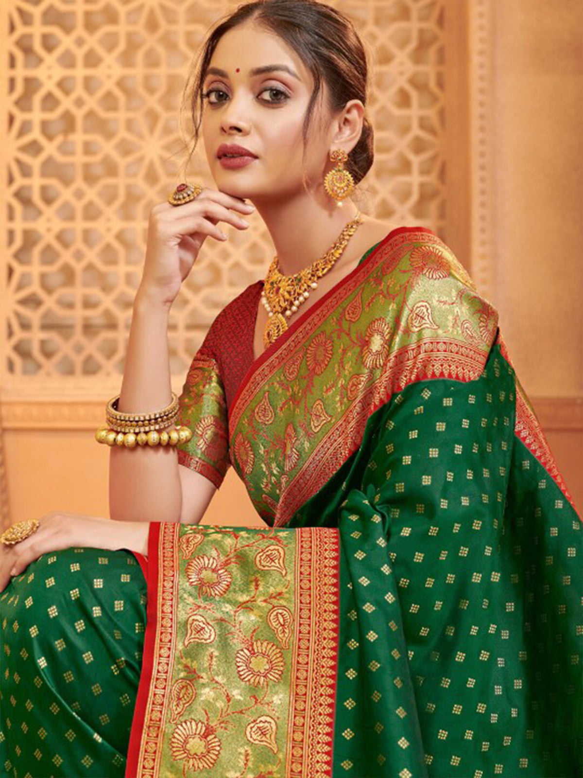 Green silk saree with contrast red blouse