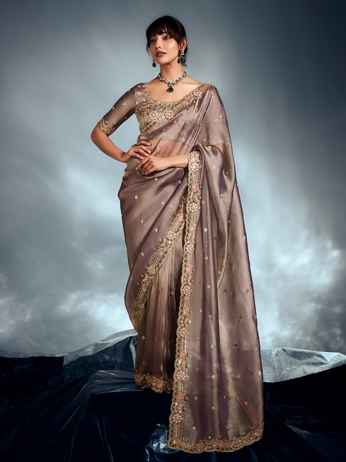 Grey organza saree with rich detailing
