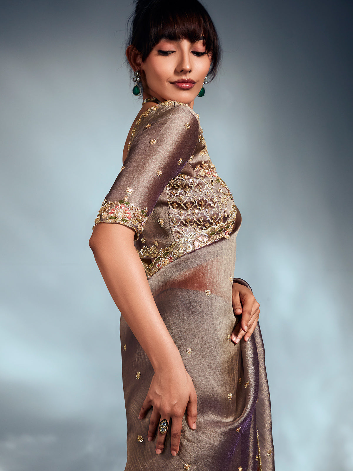 Grey organza saree with rich detailing