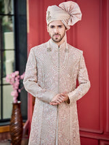 Light pink silk fabricated peshwahi style sherwani