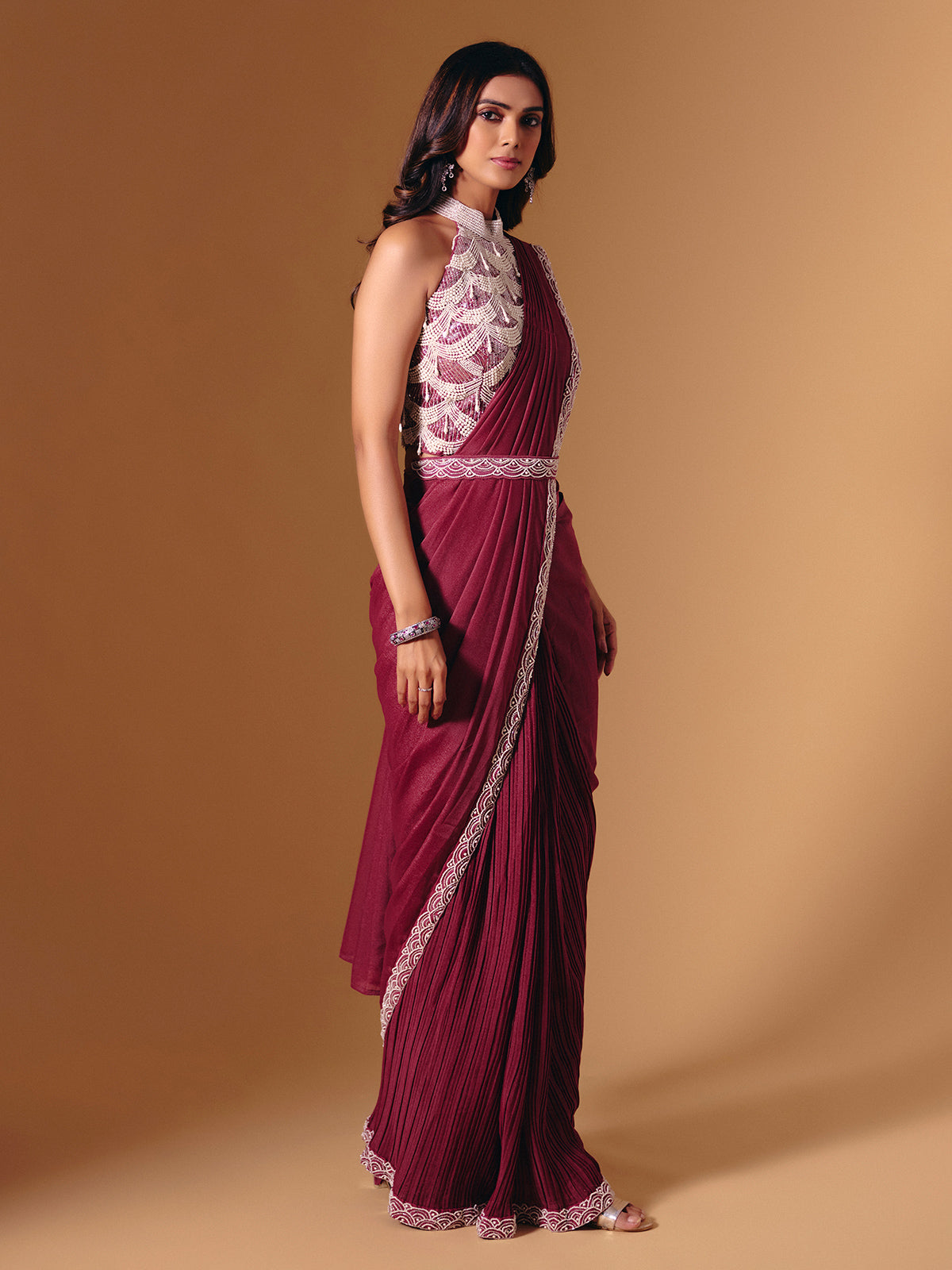 Maroon cruss lycra saree with sequins and pearl highlights