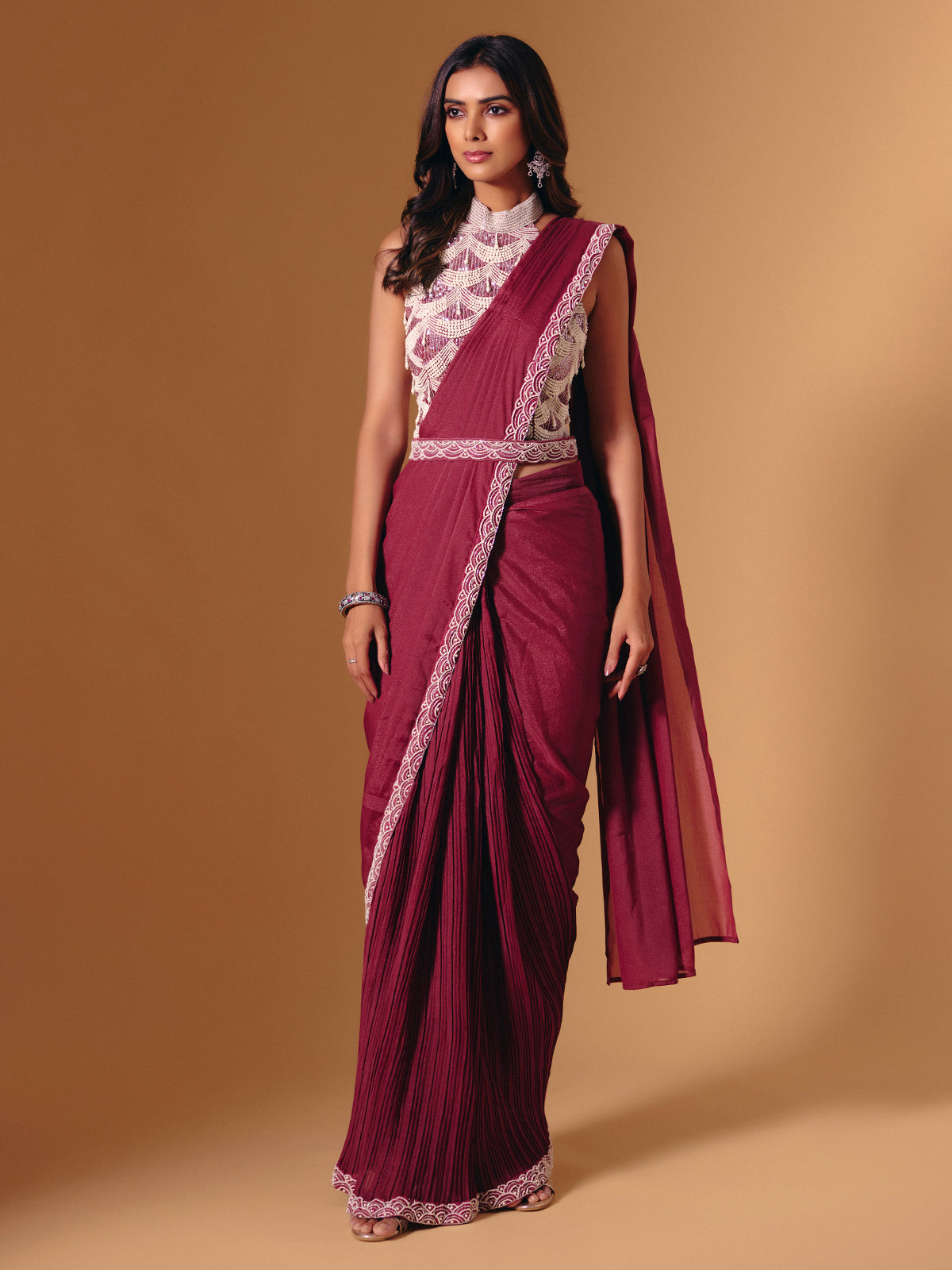 Maroon cruss lycra saree with sequins and pearl highlights