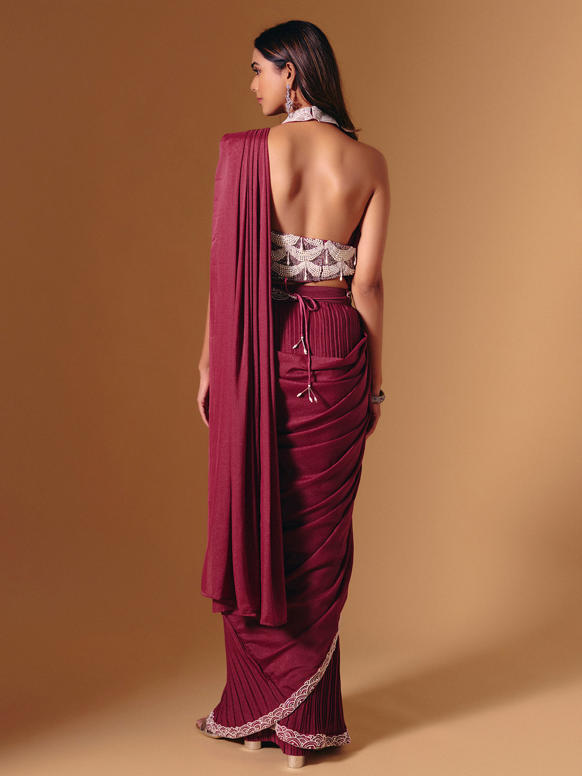 Maroon cruss lycra saree with sequins and pearl highlights