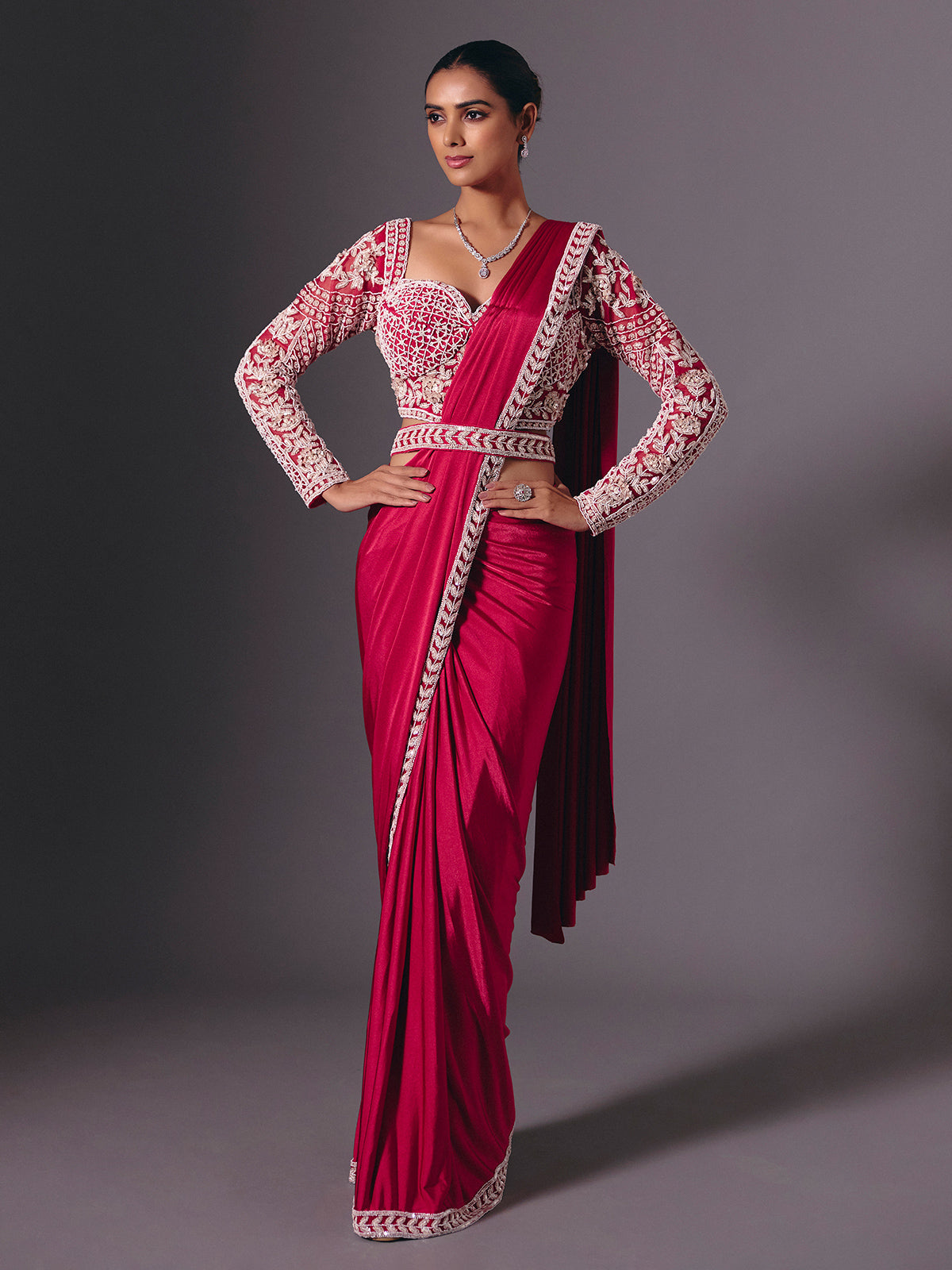 Maroon lycra saree with rich multi work embellishments