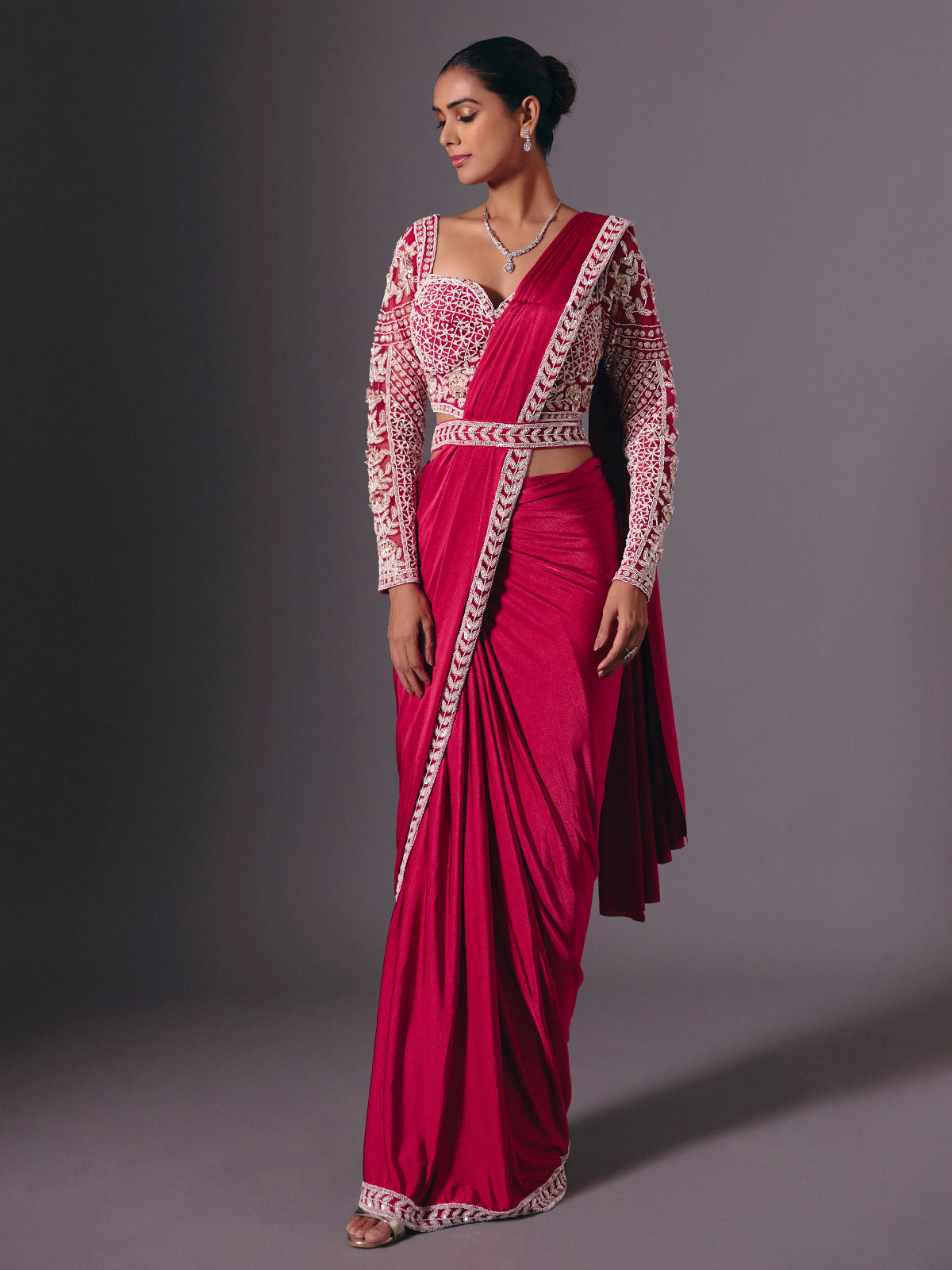 Maroon lycra saree with rich multi work embellishments