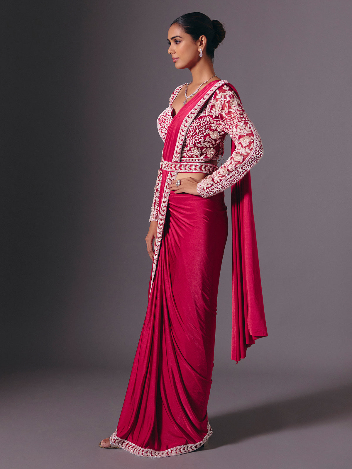 Maroon lycra saree with rich multi work embellishments