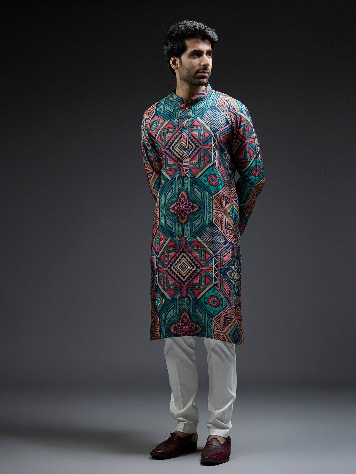 Multi coloured silk kurta suit in geometric print