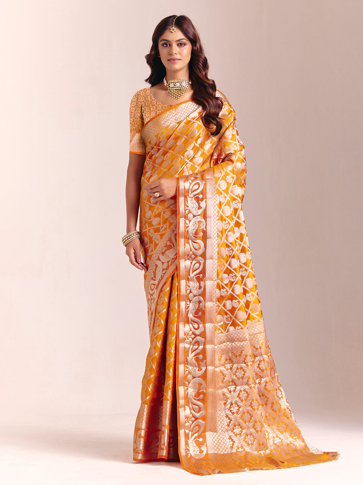Mustard yellow silk saree with rich zari craftsmanship