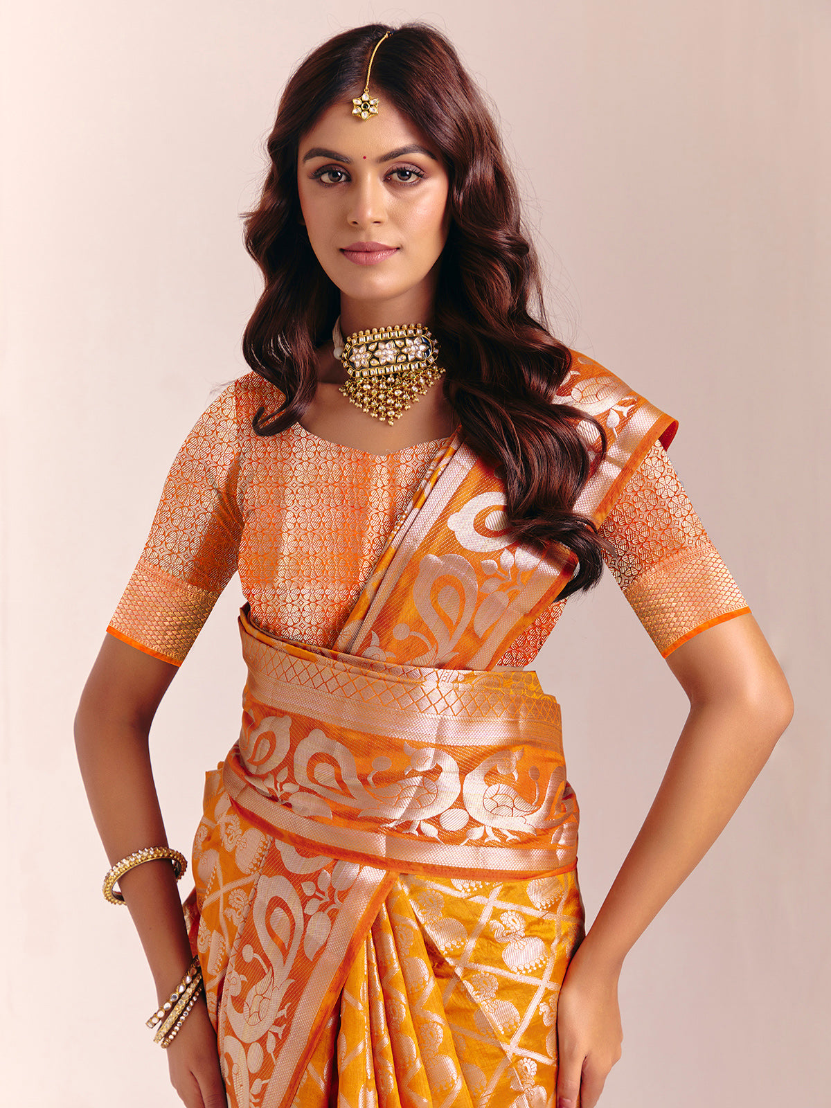 Mustard yellow silk saree with rich zari craftsmanship