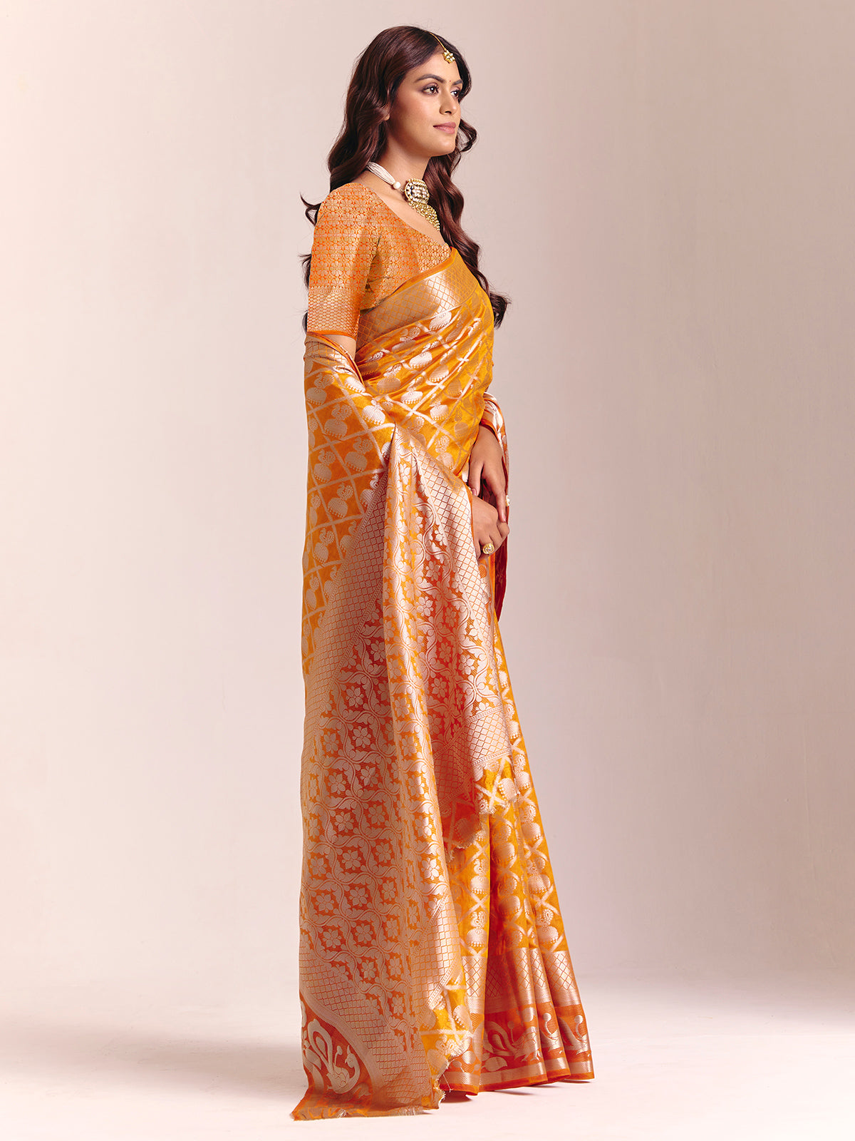 Mustard yellow silk saree with rich zari craftsmanship
