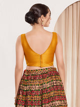 Mustard yellow silk u neck sleeveless festive blouse