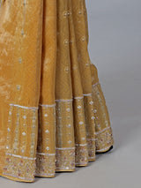 Mustard yellow tissue saree with cutdana work