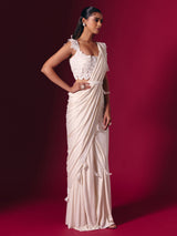 Off white lycra saree with elegant heavy embellishments