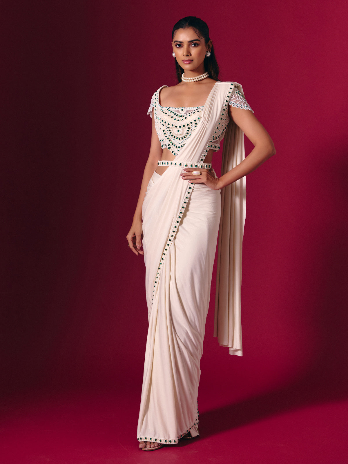 Off white lycra saree with stone and pearl detailing