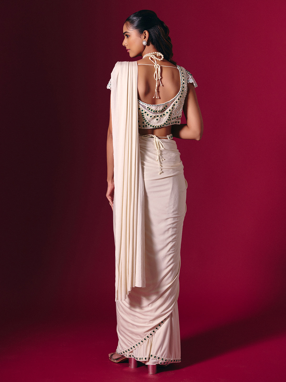 Off white lycra saree with stone and pearl detailing