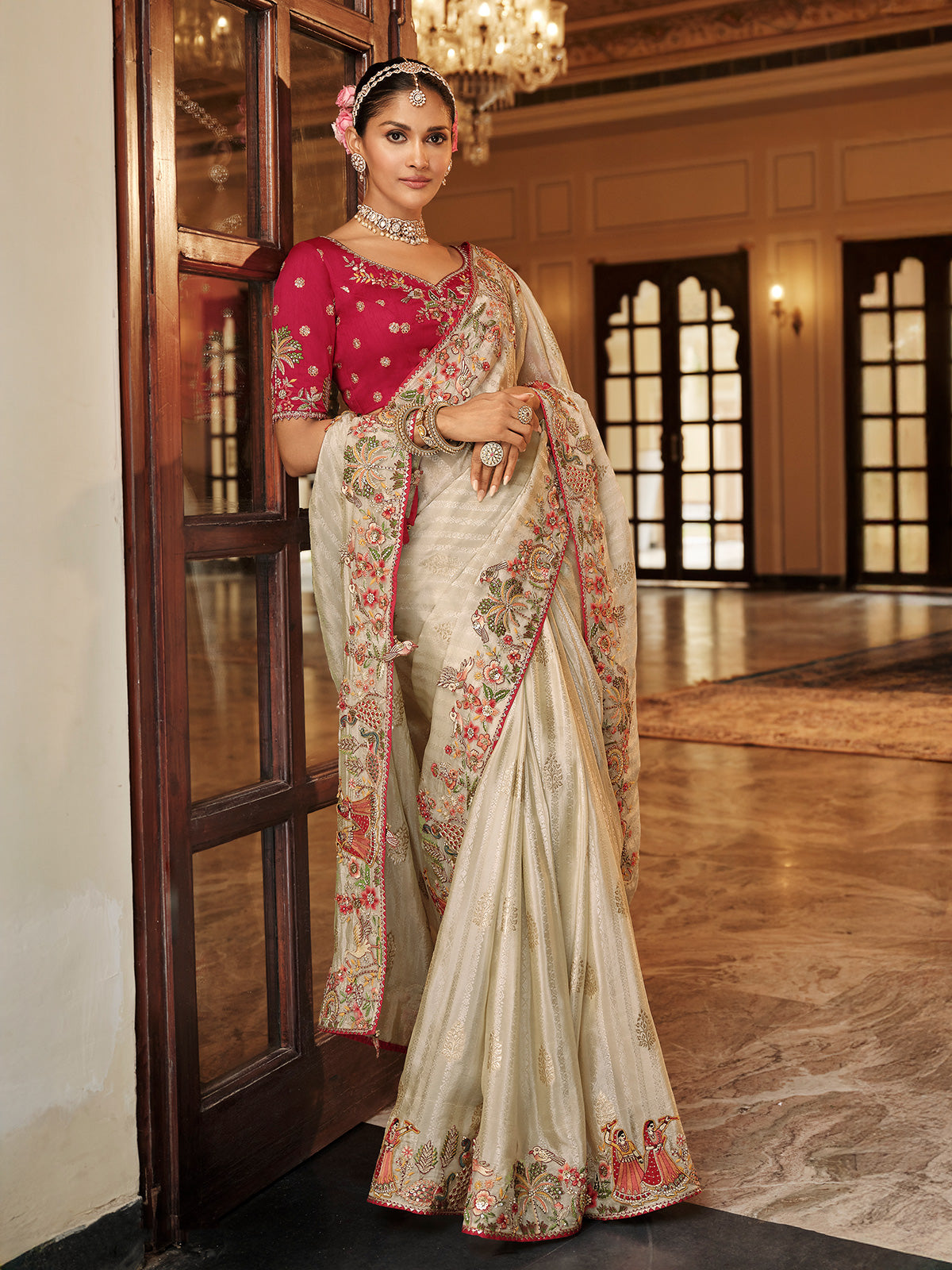 Off white silk festive wear saree with red blouse