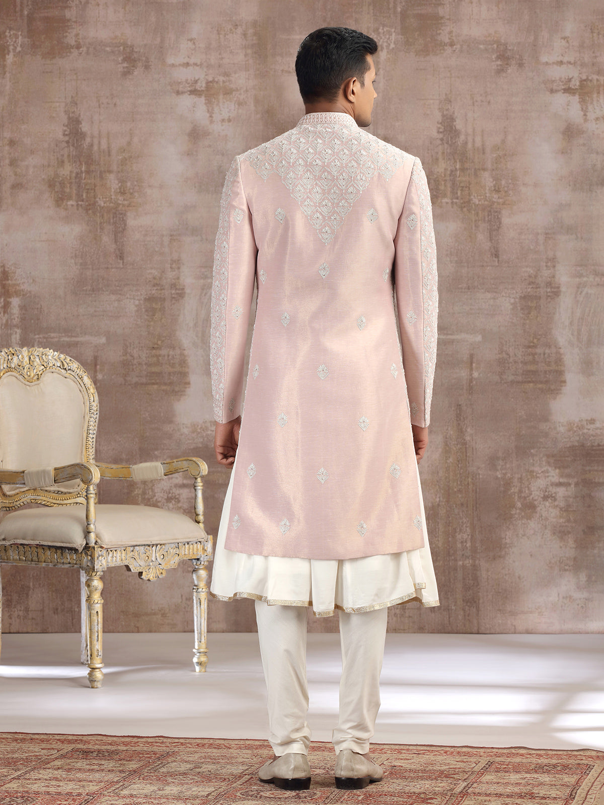 Peach silk peshwai sherwani with graceful accents
