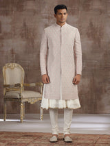 Peach silk peshwai sherwani with graceful accents
