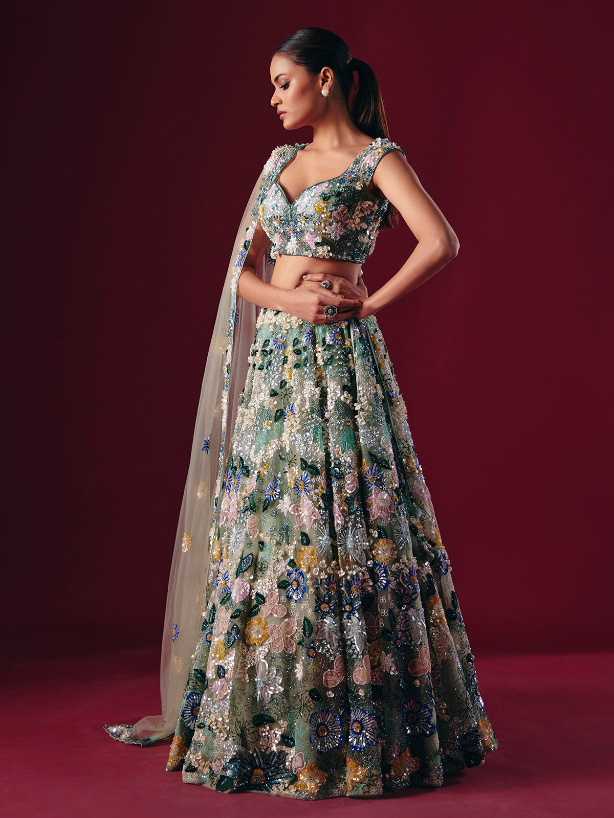 Pista green net lehenga choli with threaded pearl beauty