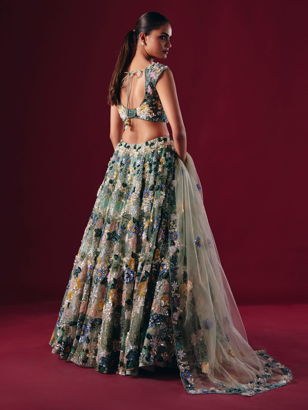 Pista green net lehenga choli with threaded pearl beauty