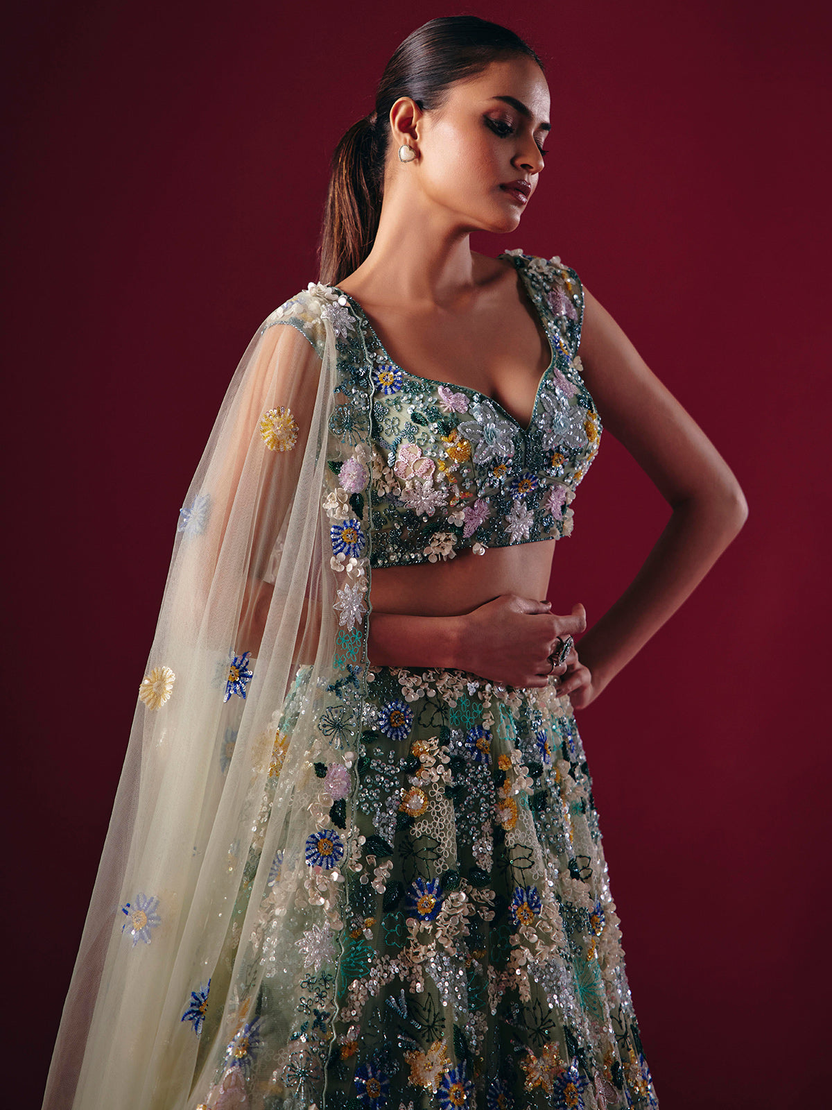 Pista green net lehenga choli with threaded pearl beauty