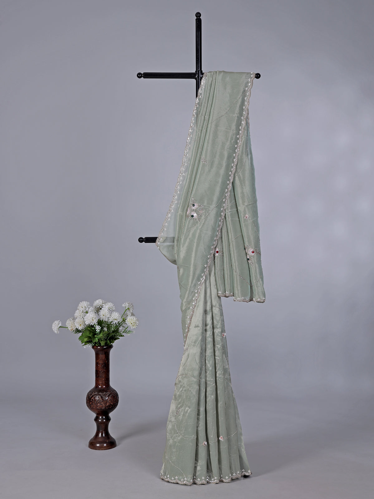 Pista green soft tissue silk saree for reception wear